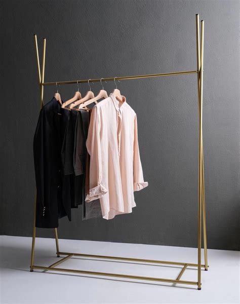 clothes rack with gucci.png|17 GUCCI CLOTHING RACK ideas .